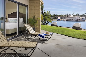 In-room safe, desk, blackout drapes, iron/ironing board at Bahia Resort Hotel