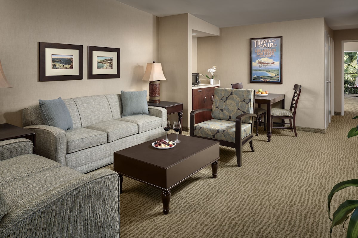 Suite, 2 Queen Beds, Garden View (Garden Suite Queens 2nd Floor) | In-room safe, desk, blackout curtains, iron/ironing board