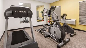 A gym with treadmills, an elliptical, and a mirrored wall. - Days Inn by Wyndham Sidney NE (Sidney)