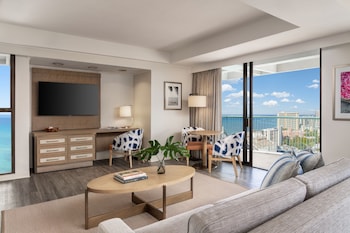 Renovated Corner Jr. Suite King, Tower | Living area | 32-inch TV with cable channels, pay movies at Sheraton Princess Kaiulani Waikiki Beach