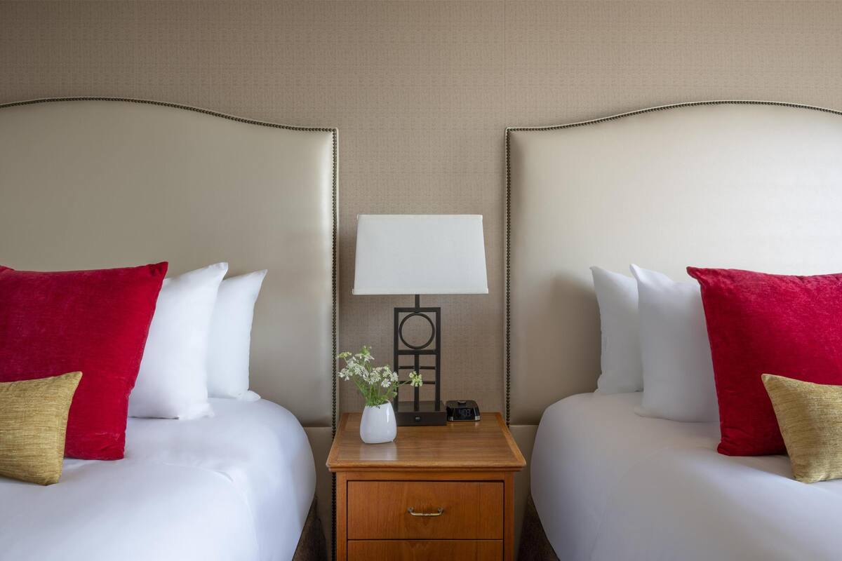 Deluxe Room, 2 Double Beds | Premium bedding, down comforters, pillowtop beds, in-room safe