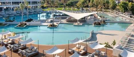 Indoor pool, seasonal outdoor pool, pool umbrellas, pool loungers