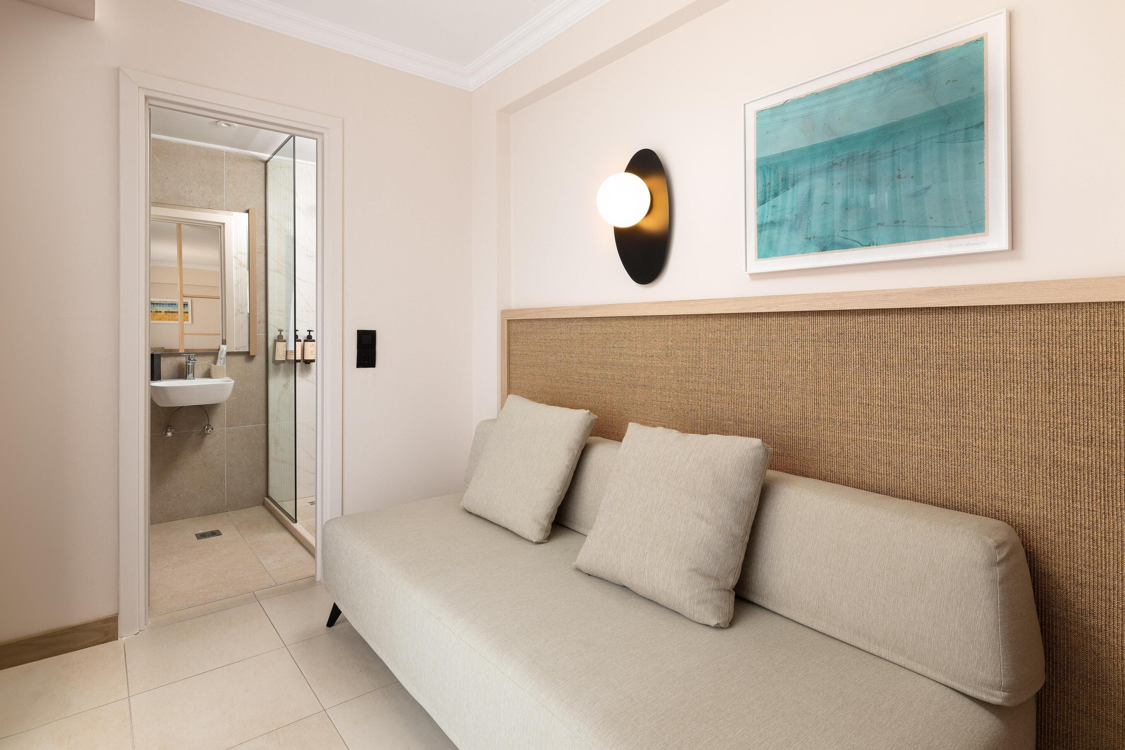 Deluxe Suite, Beachfront | In-room safe, soundproofing, free WiFi, bed sheets
