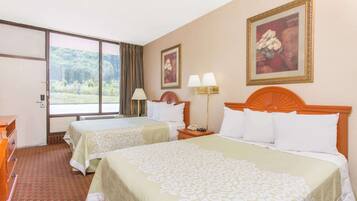 Desk, laptop workspace, blackout drapes, iron/ironing board