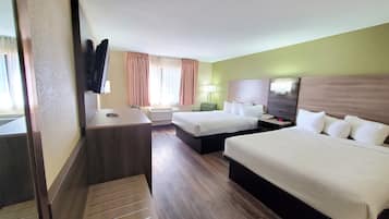 Premium bedding, desk, iron/ironing board, free cribs/infant beds