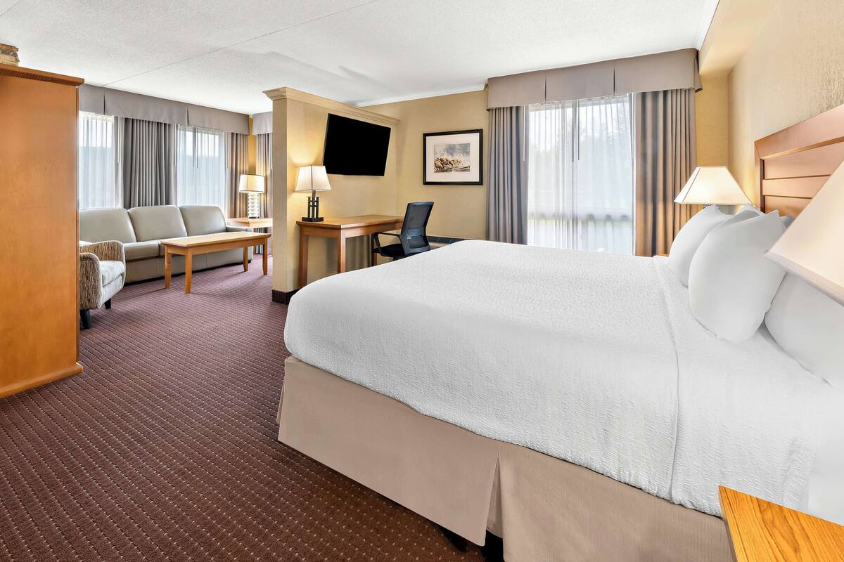 1 bedroom, premium bedding, blackout curtains, iron/ironing board