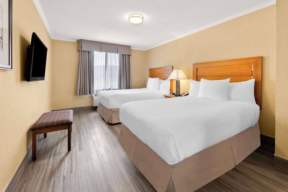 Suite, 2 Double Beds, Non Smoking, Refrigerator & Microwave (Living Room;with Sofabed) | Premium bedding, blackout drapes, iron/ironing board, WiFi