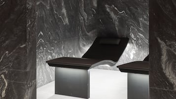 Contemporary space with a curved wall and recessed seating area.