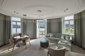 Suite, Lake View, Tower | Living area | Flat-screen TV, pay movies