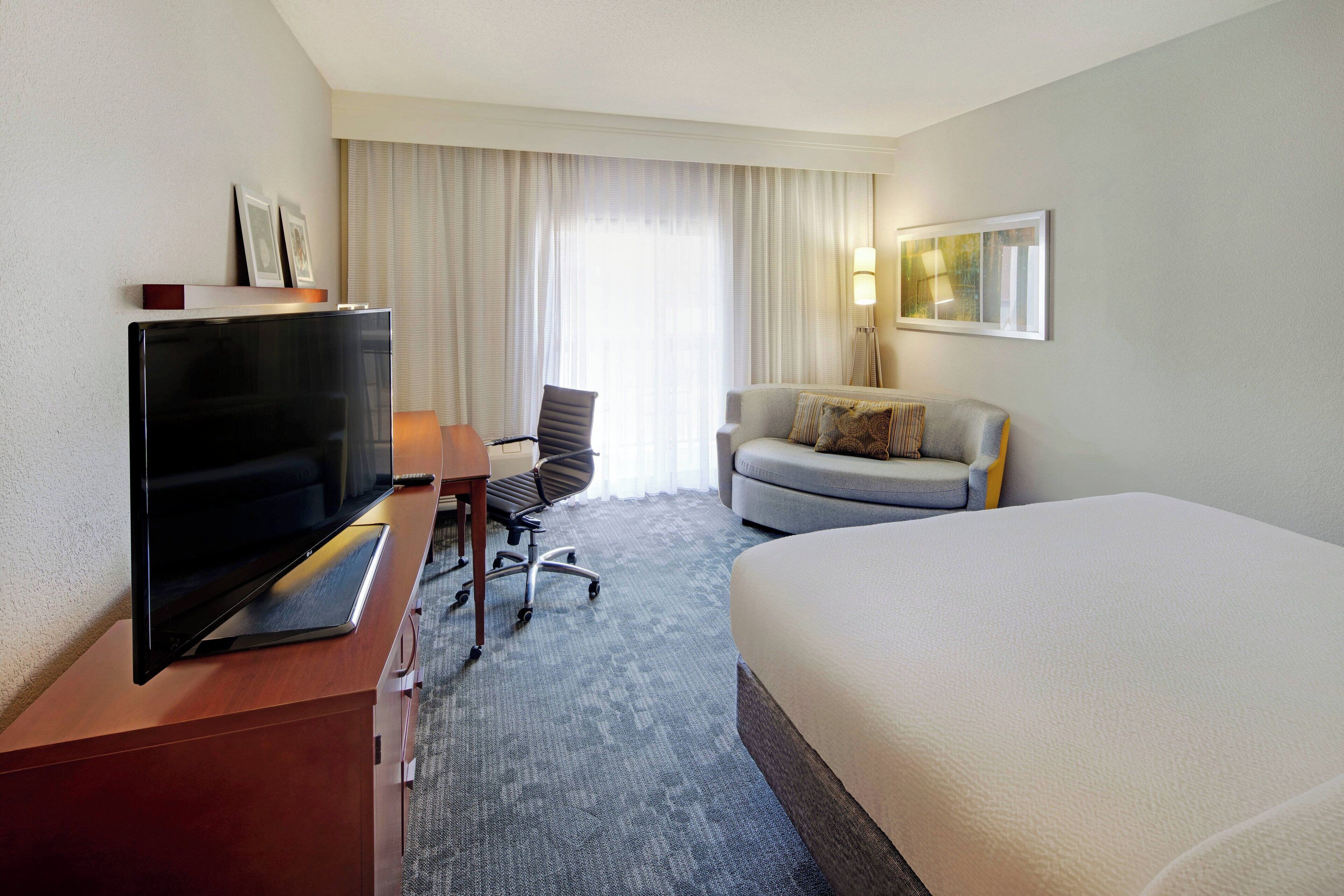 room, 1 king bed with sofa bed | premium bedding, desk, blackout curtains, iron/ironing board