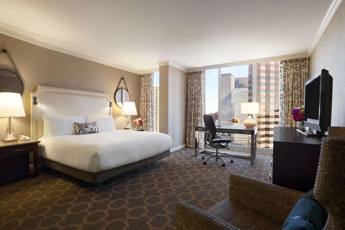 deluxe room, 1 king bed, city view | minibar, in-room safe, desk, laptop workspace