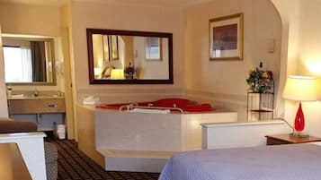 Deluxe Room, 1 King Bed, Non Smoking, Hot Tub | 1 bedroom, blackout drapes, soundproofing, iron/ironing board