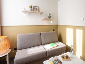Suite, plusieurs lits | Bureau, chambres insonorisées, fer et planche à repasser, Wi-Fi gratuit
