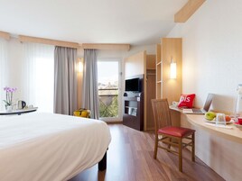 Pillow-top beds, desk, laptop workspace, blackout curtains