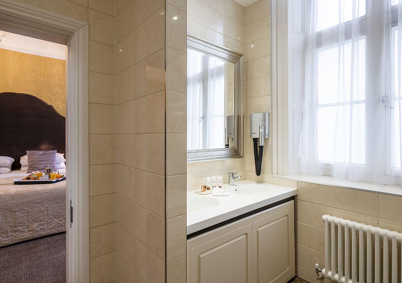 standard room (feature) | bathroom | free toiletries, hair dryer, towels