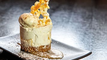 A dessert on a square plate.