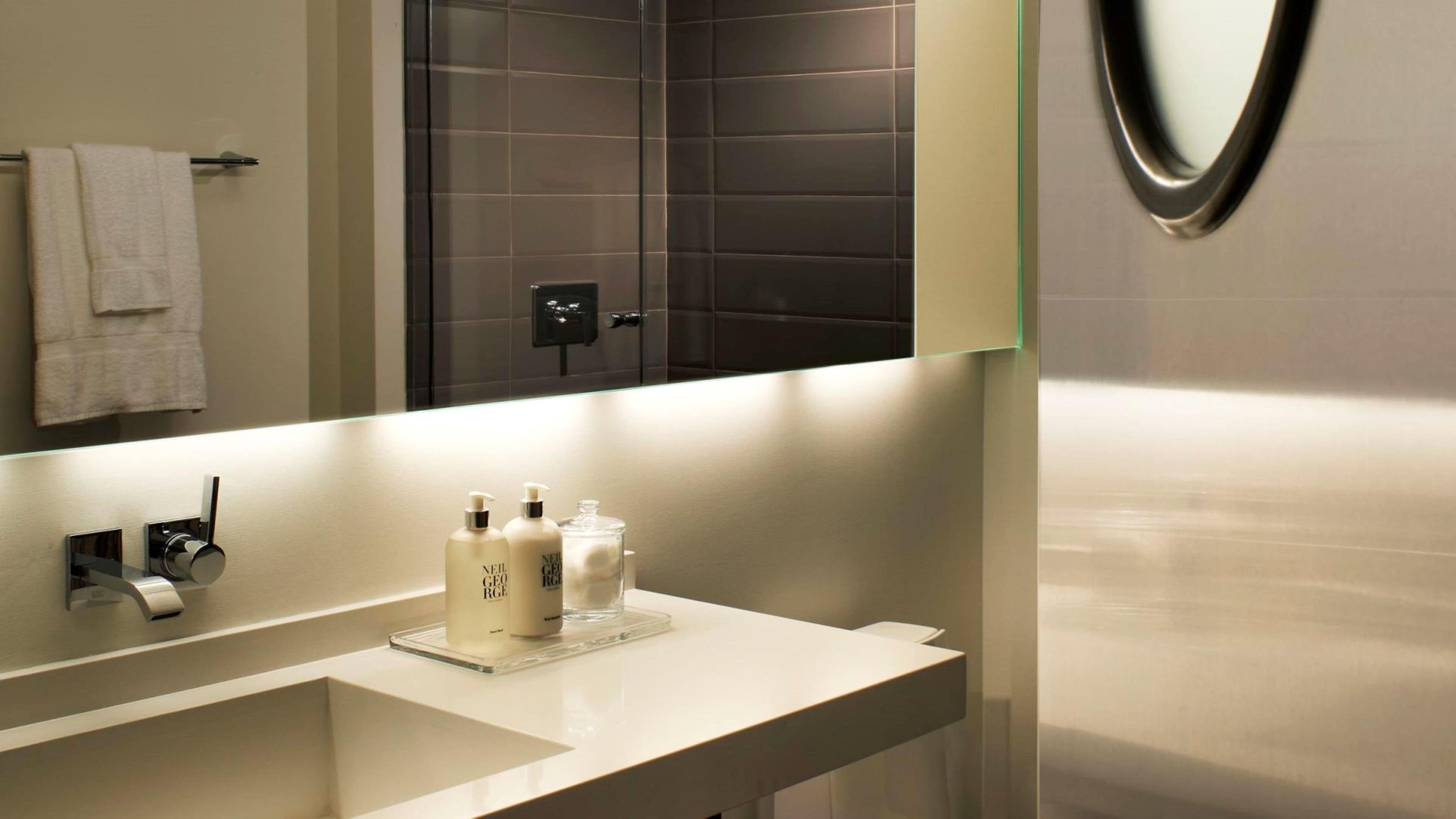 shower, designer toiletries, hair dryer, bathrobes