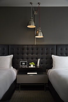 Premium bedding, down comforters, pillowtop beds, in-room safe at Hotel Zetta San Francisco