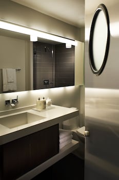 Room, 1 King Bed, Accessible (Mobility/Hearing, Roll-in Shower) | Bathroom | Shower, designer toiletries, hair dryer, bathrobes at Hotel Zetta San Francisco