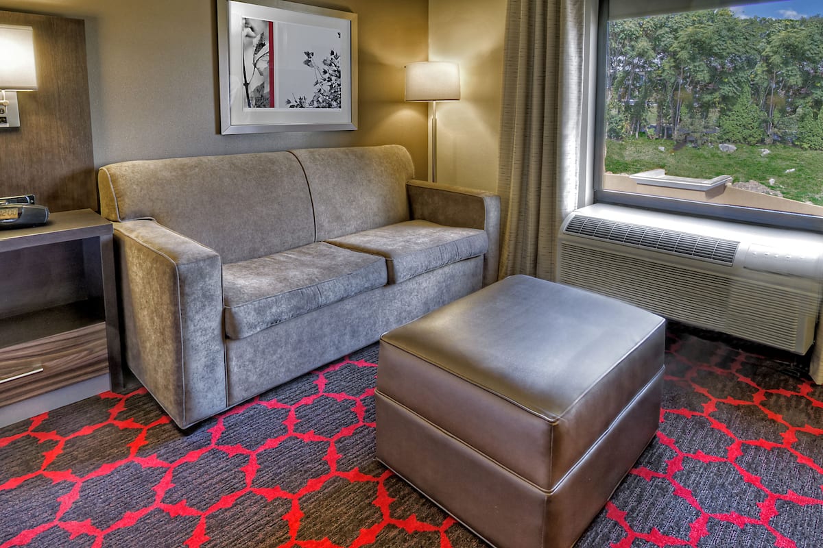 king bed with sofabed | premium bedding, pillow-top beds, free wifi, bed sheets