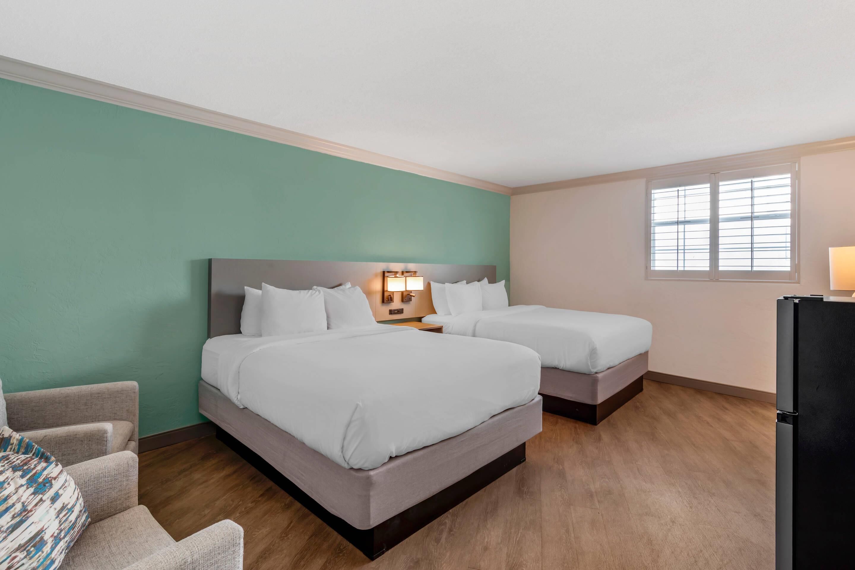 Room, Multiple Beds, Non Smoking | Desk, laptop workspace, blackout drapes, iron/ironing board