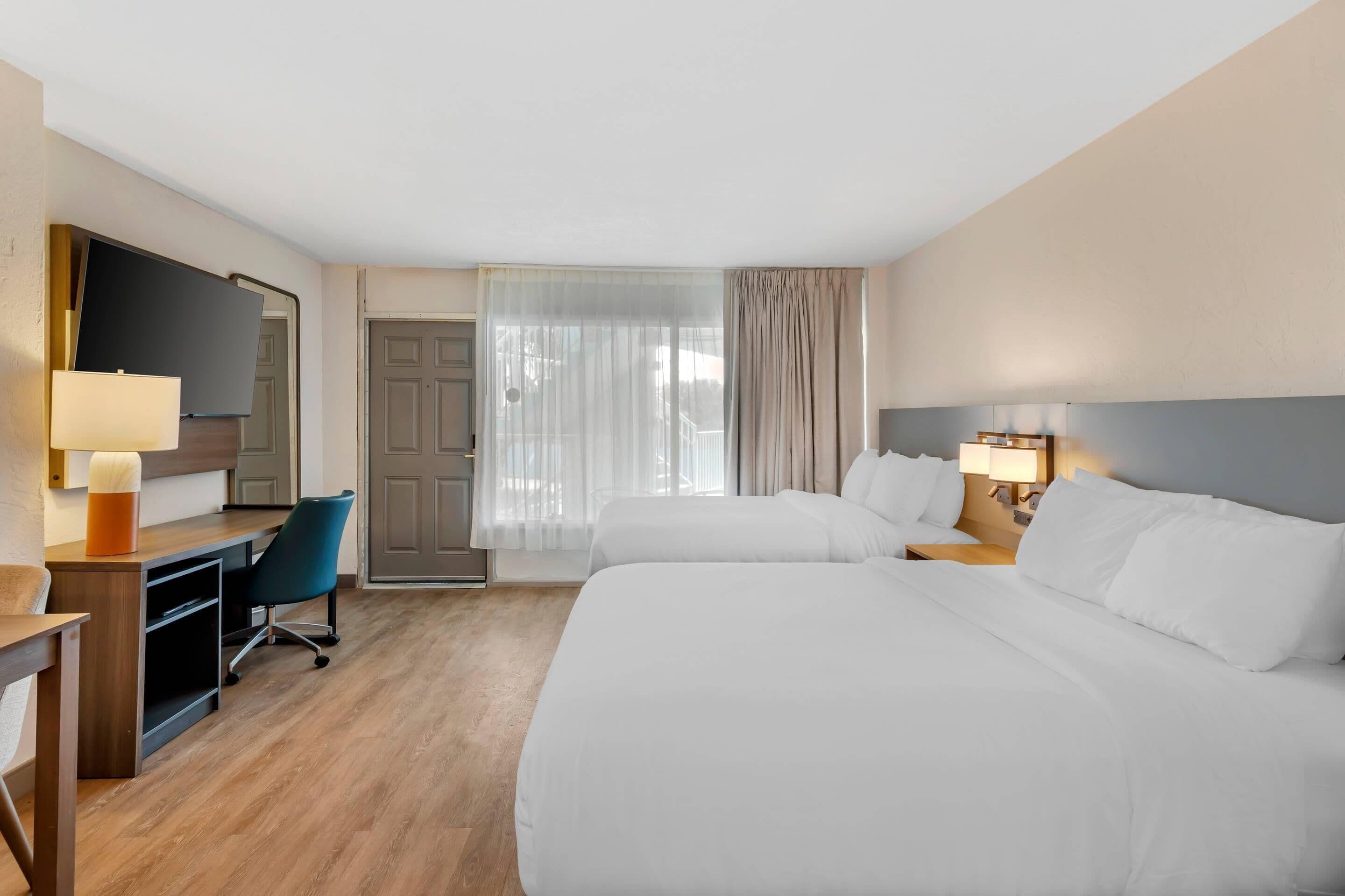 Desk, laptop workspace, blackout curtains, iron/ironing board