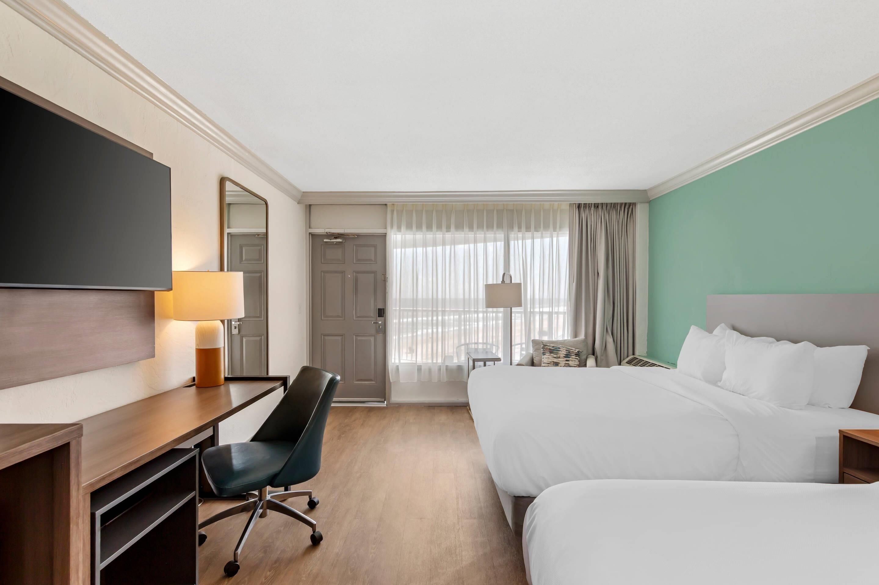 Standard Room, 2 Queen Beds, Non Smoking | Desk, laptop workspace, blackout drapes, iron/ironing board