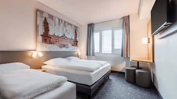 Desk, blackout drapes, soundproofing, free WiFi