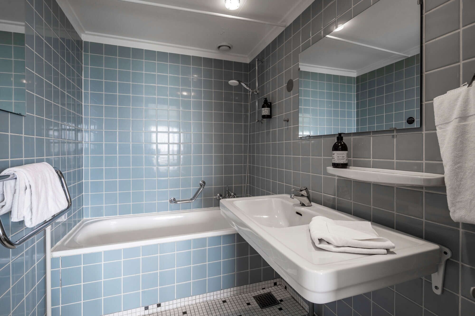 eco-friendly toiletries, hair dryer, towels, soap