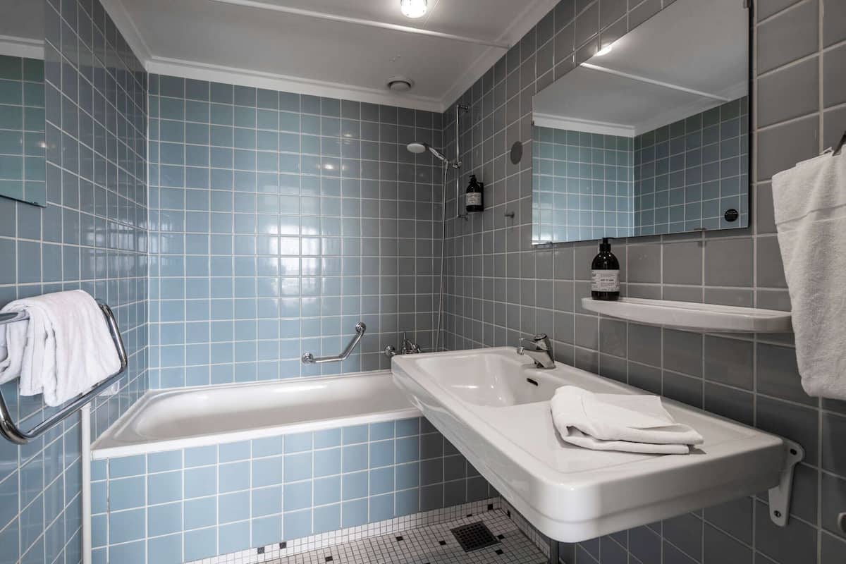 eco-friendly toiletries, hair dryer, towels, soap