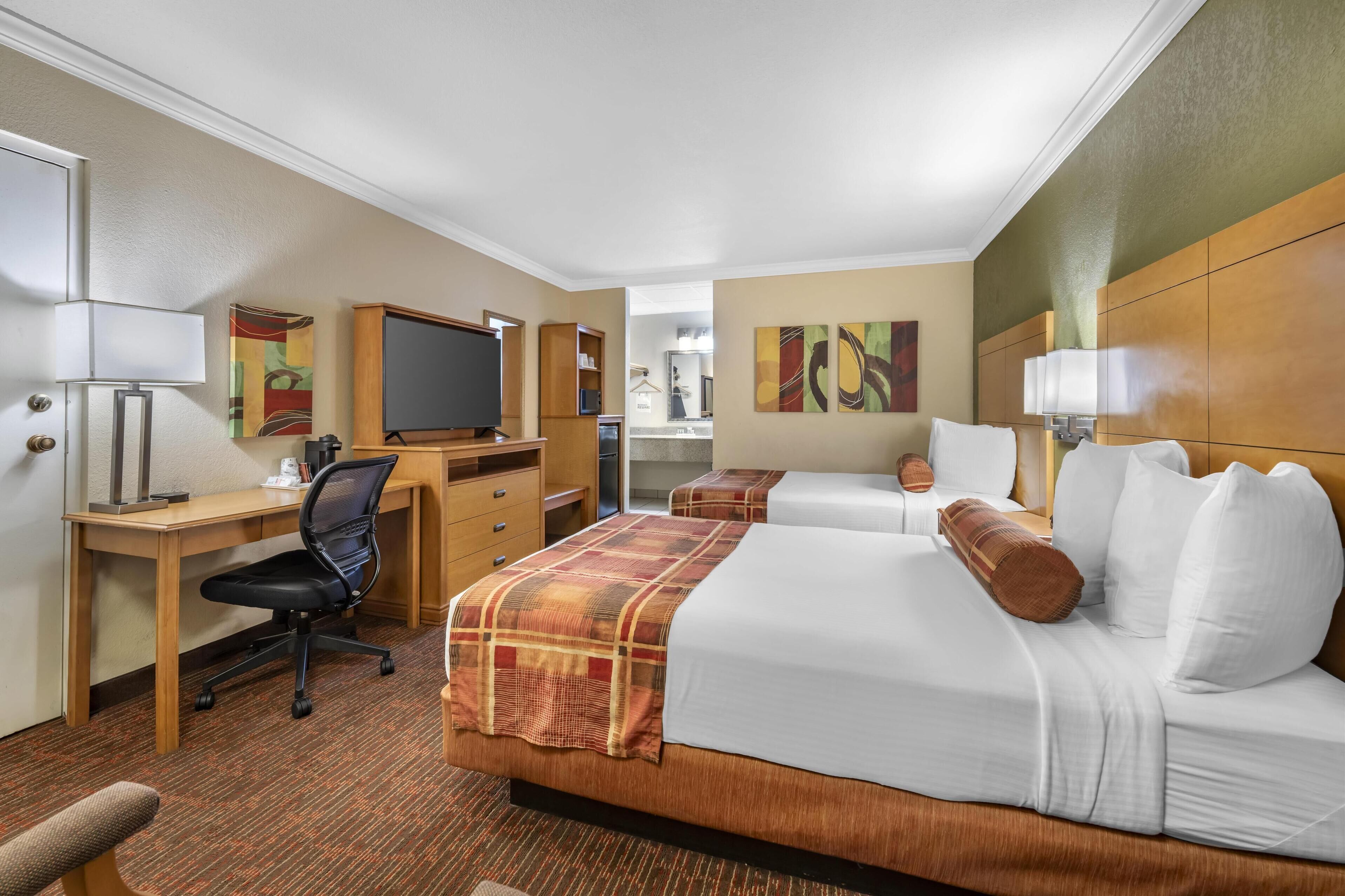 standard room, 2 double beds, non smoking, refrigerator & microwave | 1 bedroom, desk, iron/ironing board, free cots/infant beds