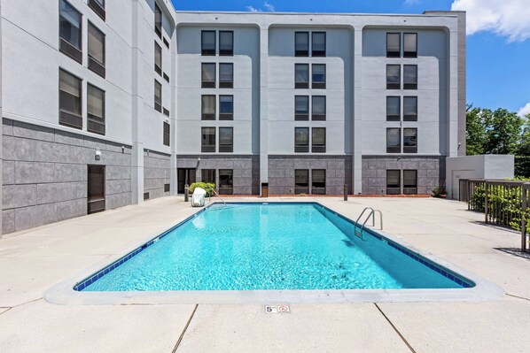 Outdoor pool, open 8:00 AM to 10:00 PM, pool umbrellas, pool loungers