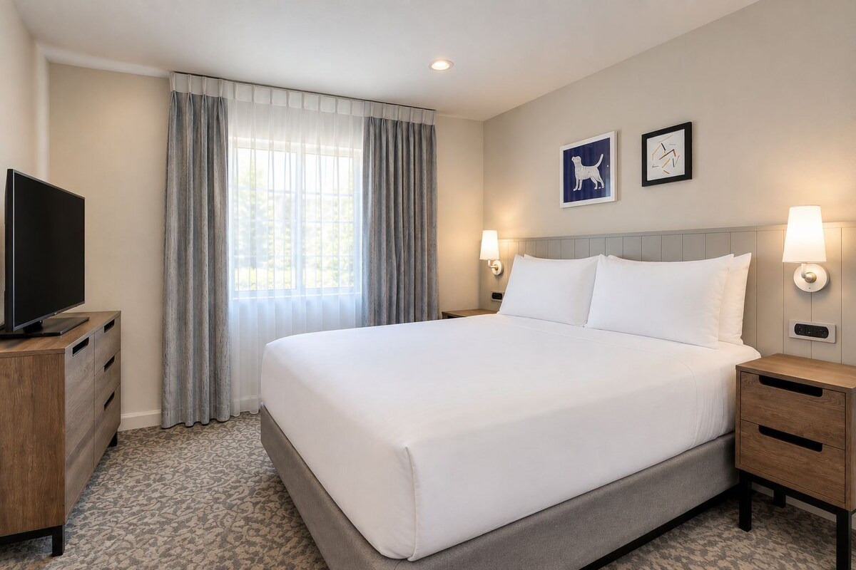 Premium bedding, pillowtop beds, desk, laptop workspace