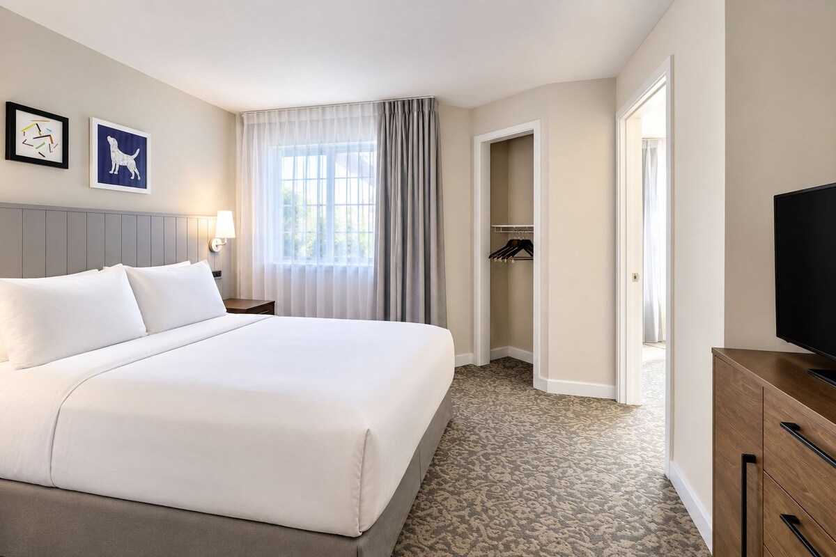Premium bedding, pillowtop beds, desk, laptop workspace