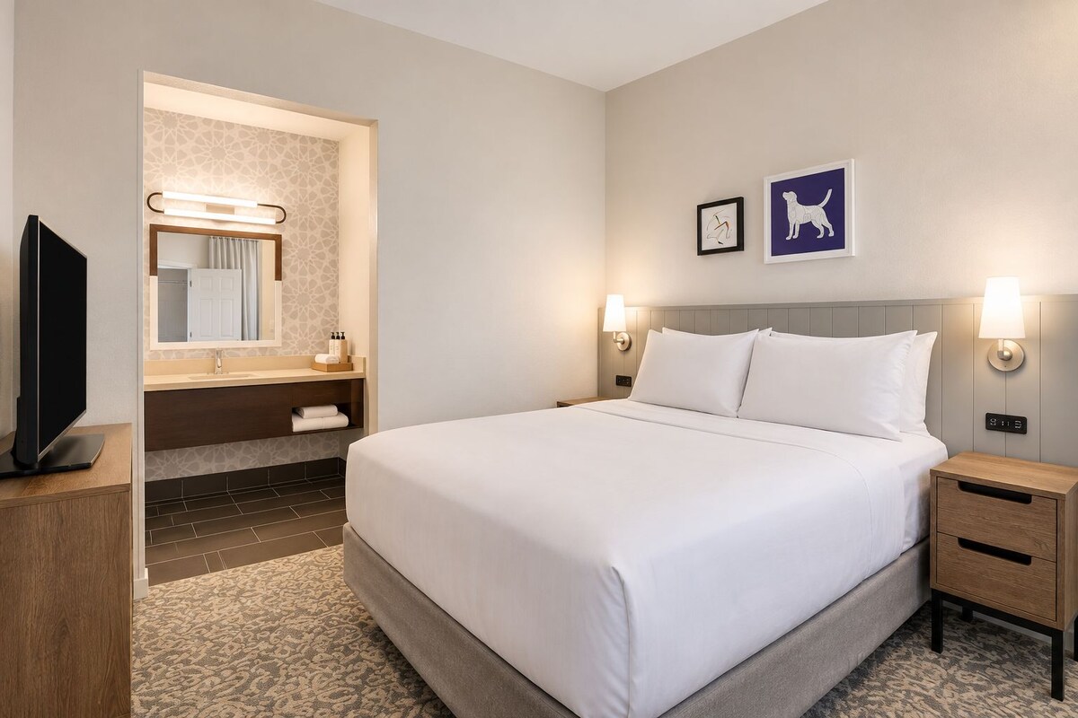 Premium bedding, pillowtop beds, desk, laptop workspace