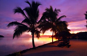 Private beach, white sand, sun loungers, beach umbrellas