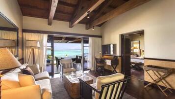 Erakor Residence | Living area | 32-inch flat-screen TV with satellite channels, TV, DVD player