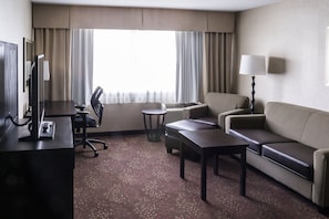 Suite, 1 King Bed (Additional Living Area) | Desk, blackout drapes, iron/ironing board, free cribs/infant beds