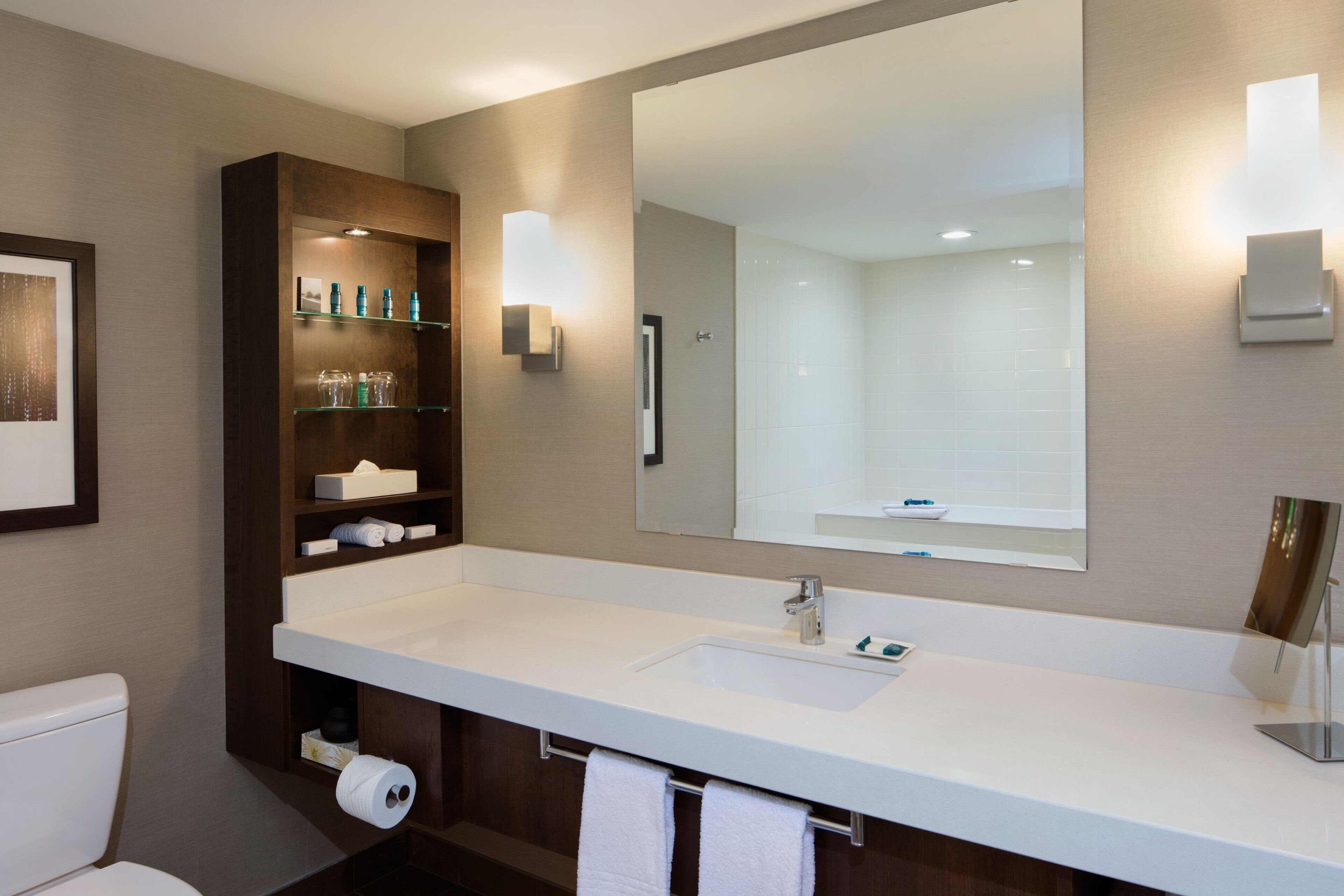 separate bathtub and shower, designer toiletries, hair dryer, towels