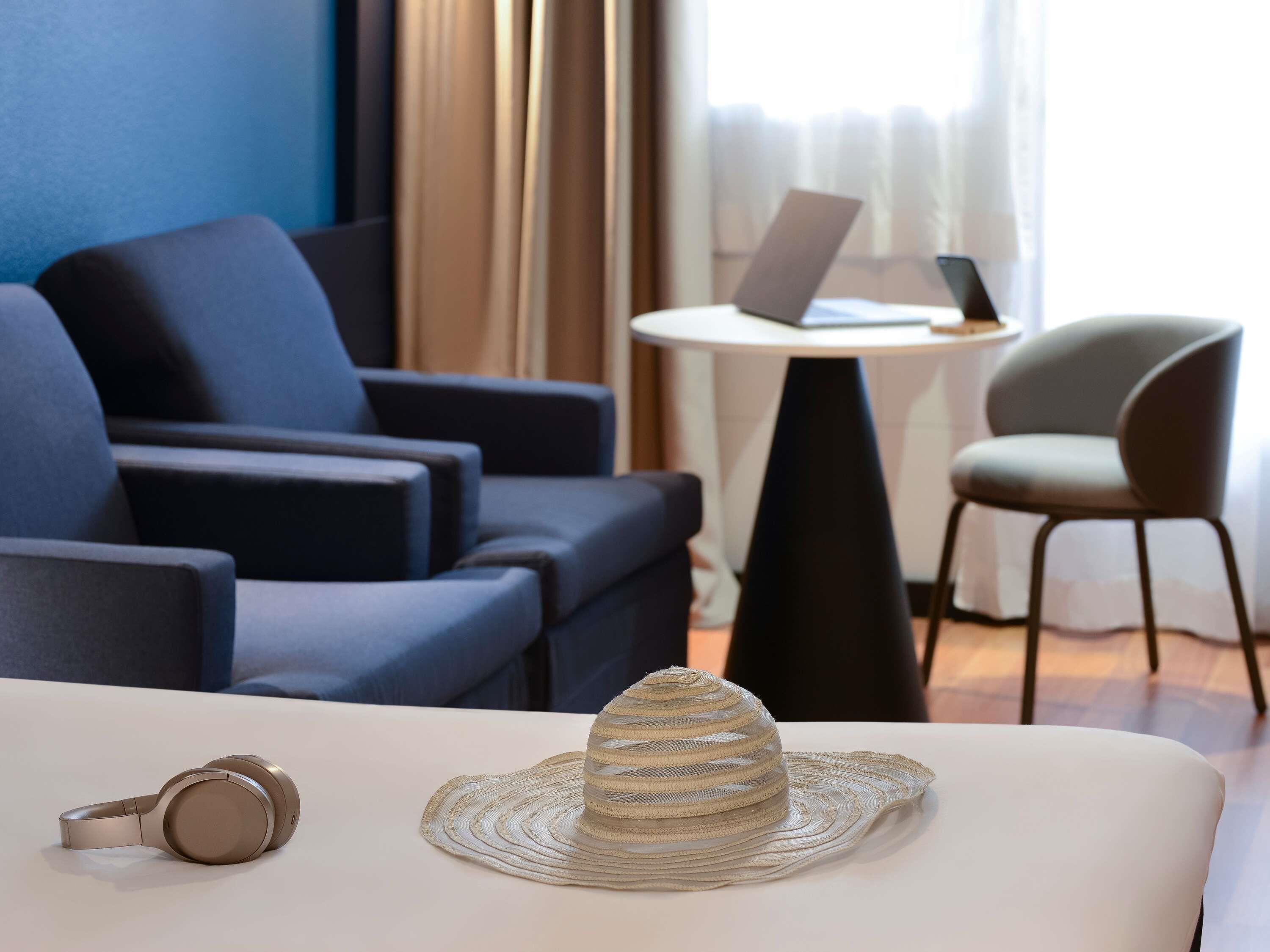 family room, multiple beds | in-room safe, individually decorated, individually furnished, desk