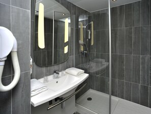 Eco-friendly toiletries, hair dryer, towels, soap