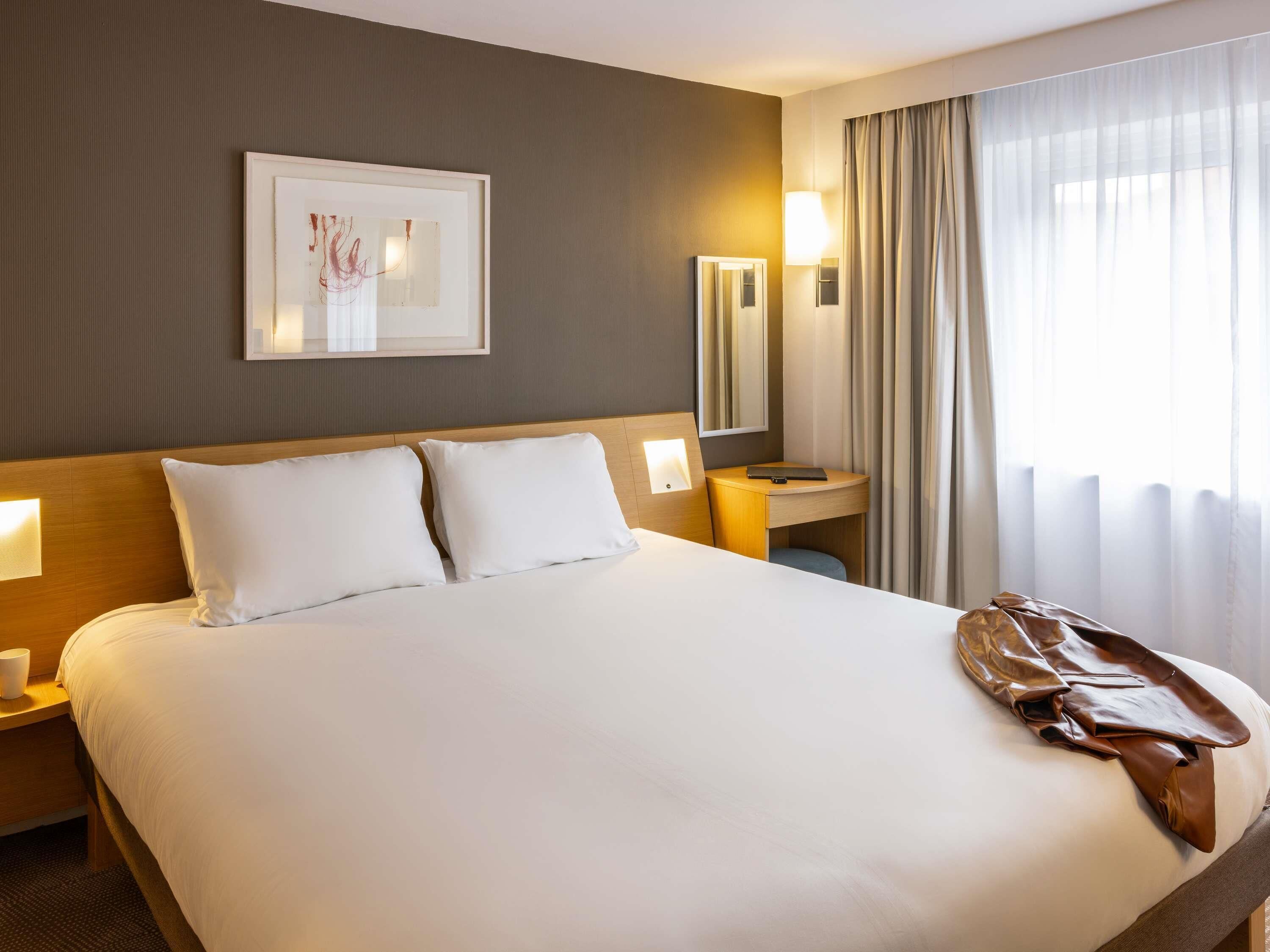 Suite, 1 cama King size y sofá cama | Ropa de cama hipoalergénica y camas con pillow-top 
