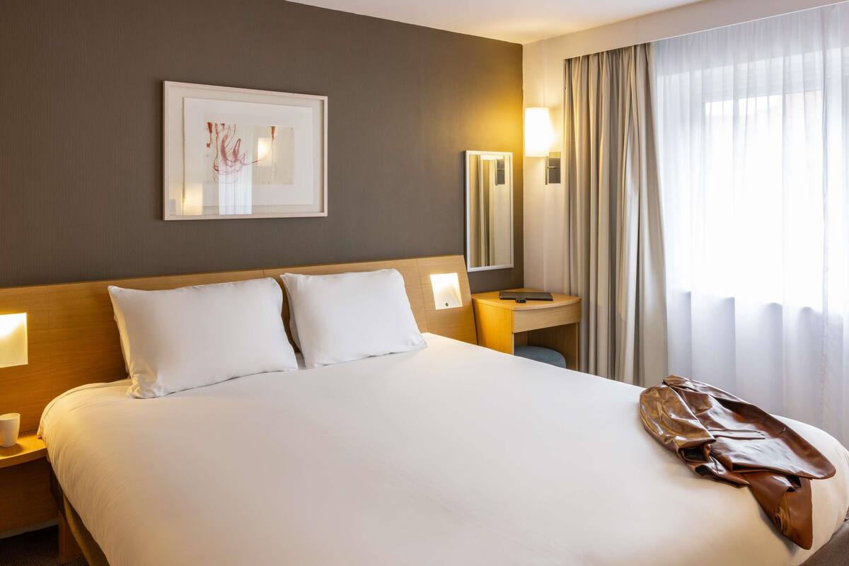 Suite, 1 cama King size y sofá cama | Ropa de cama hipoalergénica y camas con pillow-top