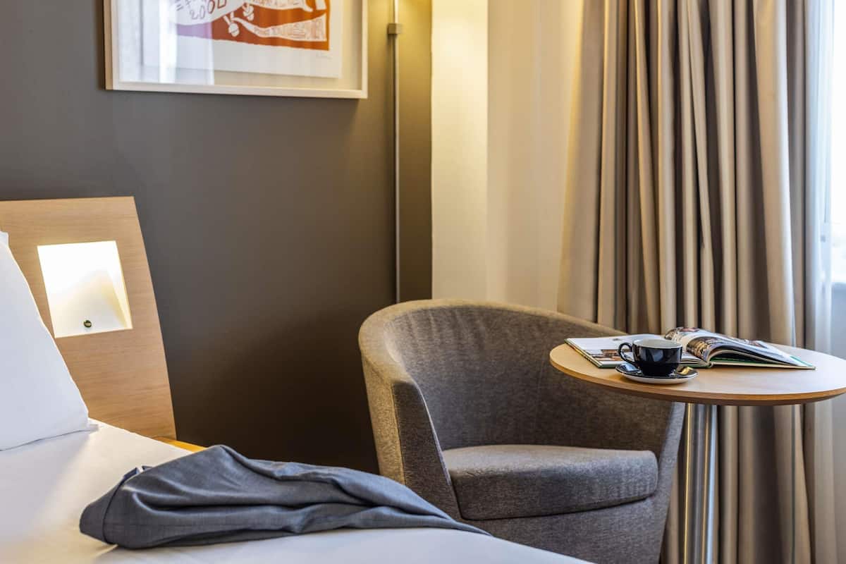 Hypo-allergenic bedding, pillow-top beds, in-room safe, desk
