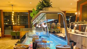 A breakfast buffet with various food items and a coffee station. - Novotel Bristol Centre (Bristol)