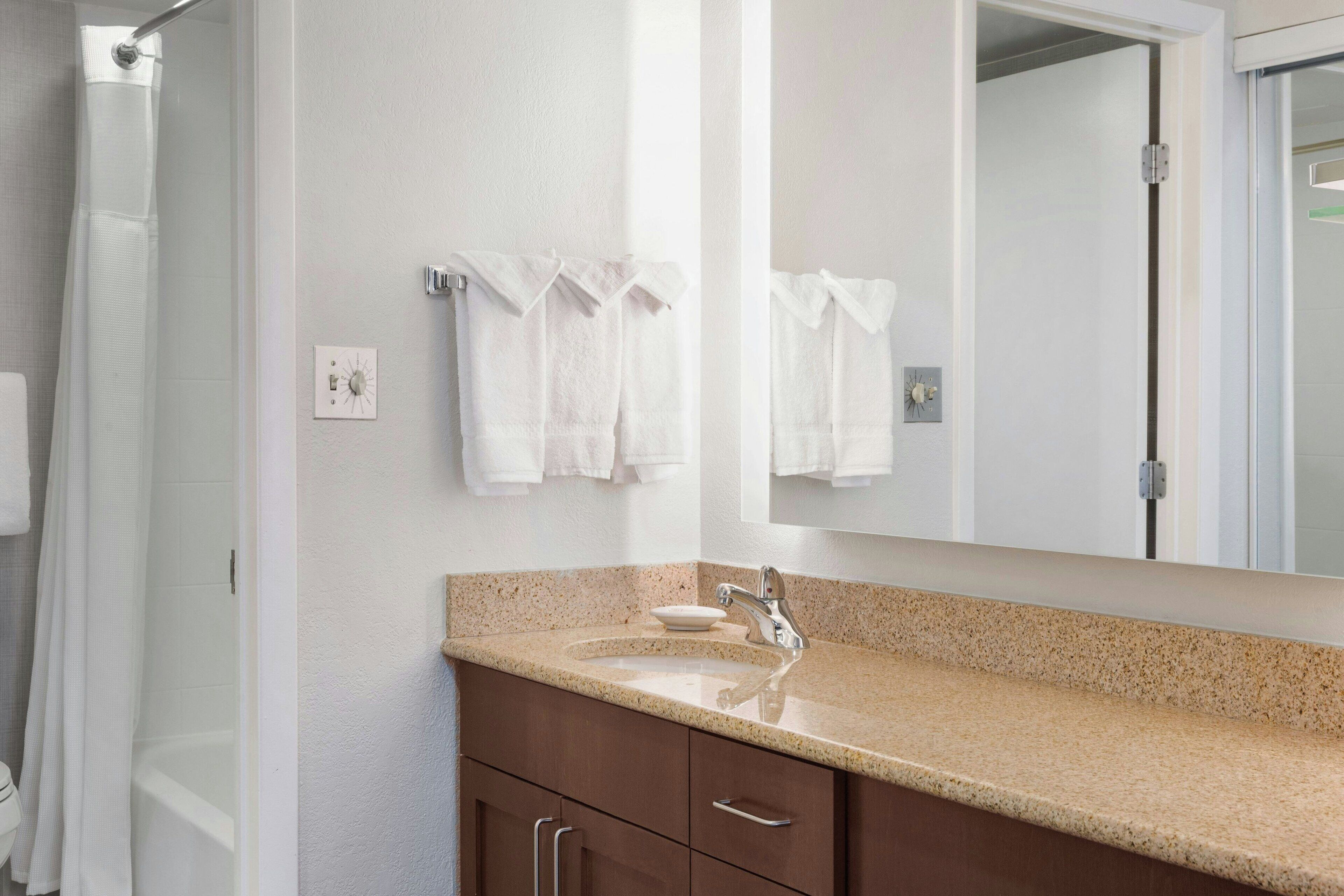 combined shower/bathtub, free toiletries, hair dryer, towels