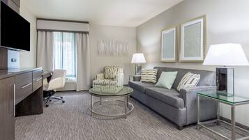 Desk, laptop workspace, blackout drapes, iron/ironing board