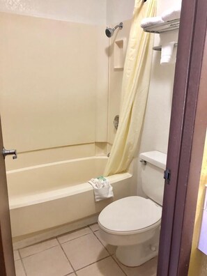 Deluxe Single Room, 1 King Bed, Non Smoking, Refrigerator & Microwave | Bathroom | Rainfall showerhead, hair dryer, towels, soap