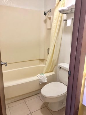 Deluxe Single Room, 1 King Bed, Non Smoking, Refrigerator & Microwave | Bathroom | Rainfall showerhead, hair dryer, towels, soap