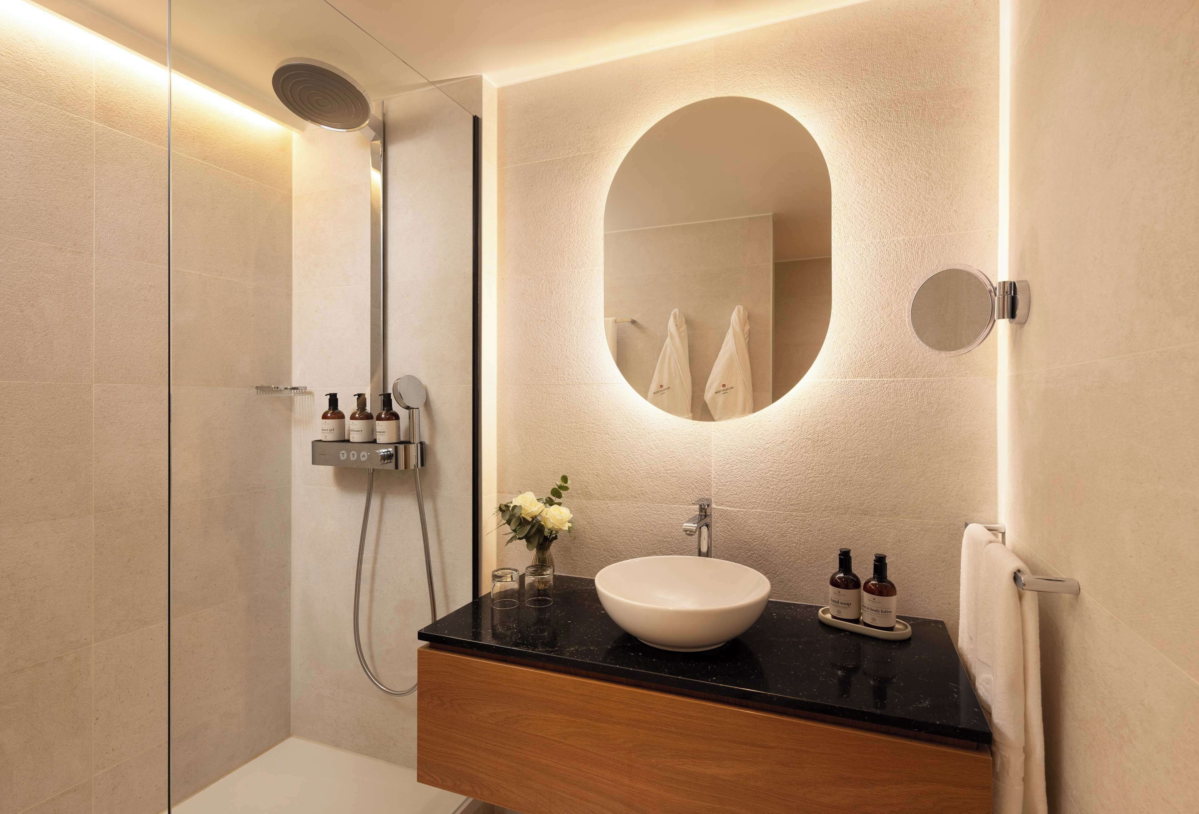 eco-friendly toiletries, hair dryer, slippers, towels